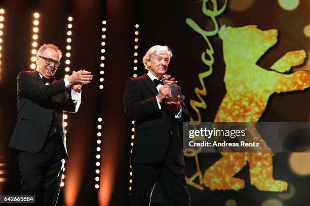 Festival director Dieter Kosslick and Jury memeber Paul Verhoeven on stage at the closing ceremony of the 67th Berlinale International Film Festival...