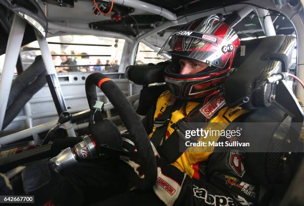 Matt DiBenedetto, driver of the EJ Wade Construction Ford, sits in his car during practice for the Monster Energy NASCAR Cup Series 59th Annual...