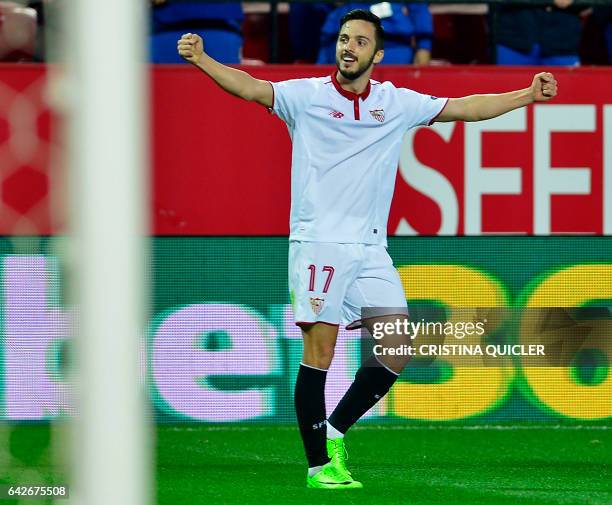 Sevilla's midfielder Pablo Sarabia celebrates after scoring during the Spanish league football match Sevilla FC vs SD Eibar on February 18, 2017. /...