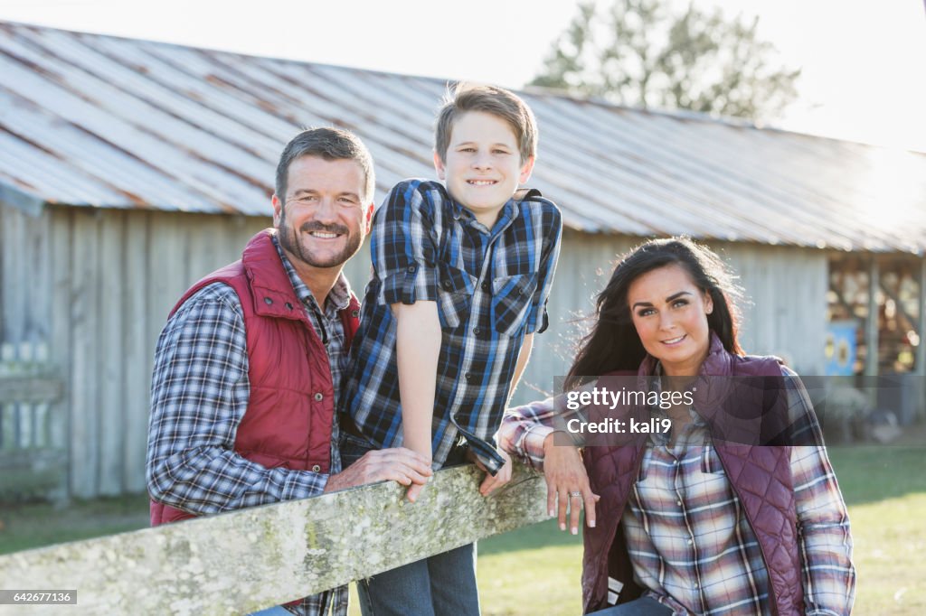 Family with teenage son on a farm