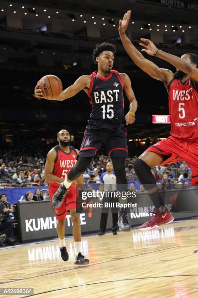 Edy Tavares of the East Team passes the ball against Keith Benson of the West Team during the 2017 NBA D-League All-Star Game Presented By Kumho Tire...