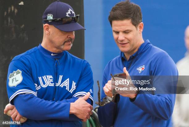 Pitching coach Pete Walker and GM Ross Atkins chat. Toronto Blue Jays welcome the entire squad today as position players join the pitchers and...