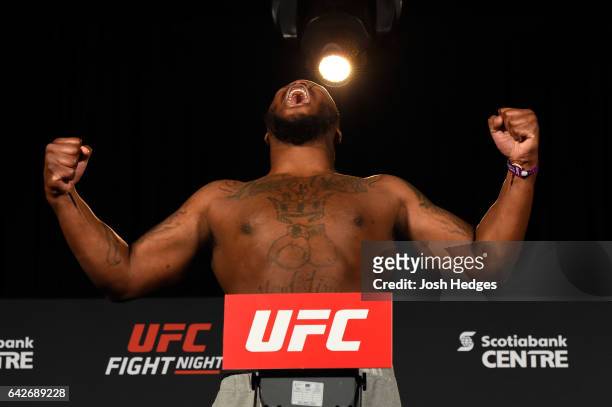 Derrick Lewis poses on the scale during the UFC Fight Night weigh-in at the World Trade Convention Centre on February 18, 2017 in Halifax, Nova...