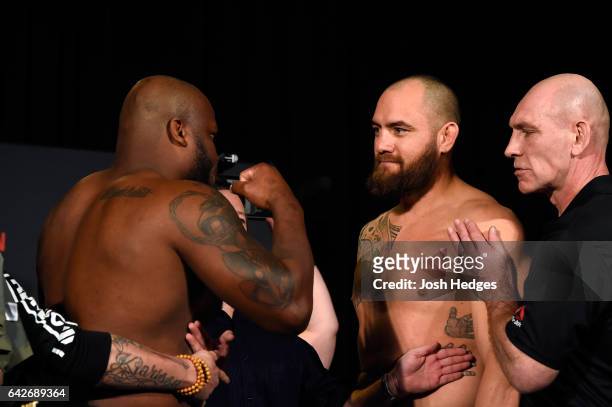 Derrick Lewis and Travis Browne face off during the UFC Fight Night weigh-in at the World Trade Convention Centre on February 18, 2017 in Halifax,...