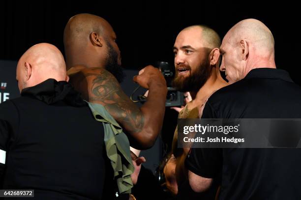 Derrick Lewis and Travis Browne face off during the UFC Fight Night weigh-in at the World Trade Convention Centre on February 18, 2017 in Halifax,...