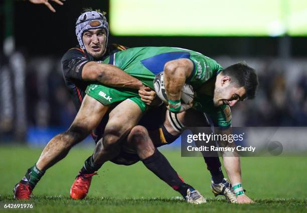 Galway , Ireland - 18 February 2017; Tiernan O'Halloran of Connacht is tackled by Ollie Griffiths of Newport Gwent Dragons during the Guinness PRO12...