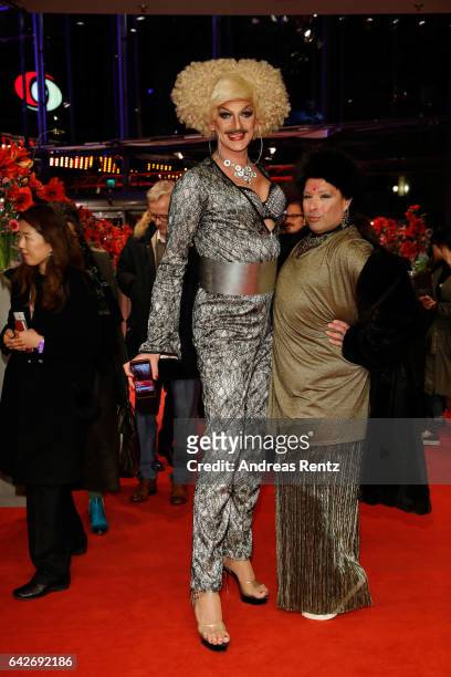 Gloria Viagra and a guest arrive for the closing ceremony of the 67th Berlinale International Film Festival Berlin at Berlinale Palace on February...