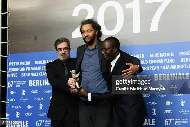 Producer Arnaud Dommerc, film director Alain Gomis and producer Oumar Sall of the movie Felicite, which won the Silver Bear Grand Jury Prize, attend...