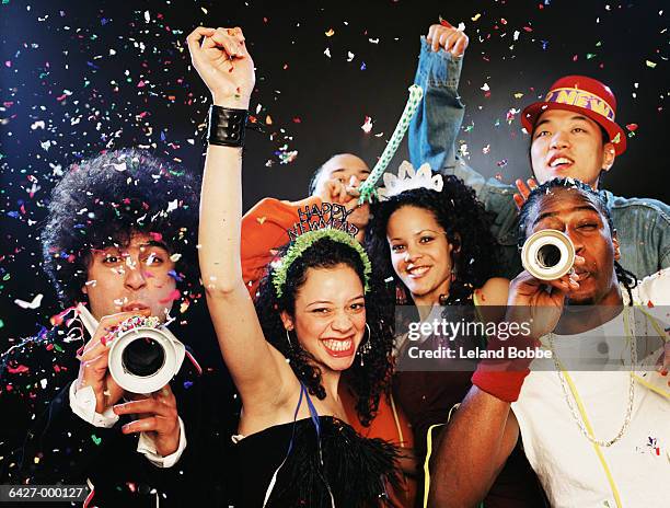 friends celebrate at new year - finale celebration stock pictures, royalty-free photos & images