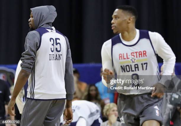 Kevin Durant of the Golden State Warriors and Russell Westbrook of the Oklahoma City Thunder attend practice for the 2017 NBA All-Star Game at the...