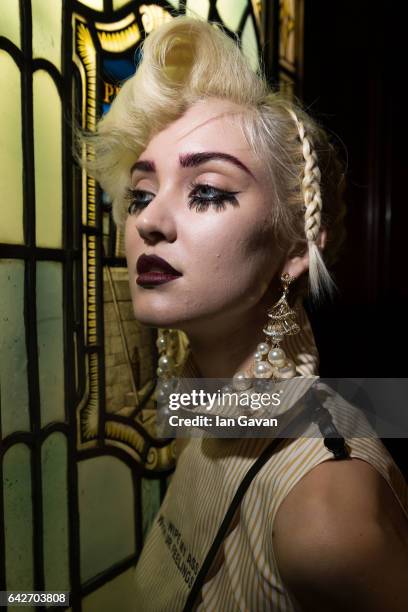 Model backstage ahead of the Han Wen show at Fashion Scout during the London Fashion Week February 2017 collections on February 18, 2017 in London,...