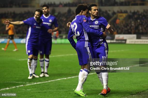Pedro of Chelsea celebrates scoring the opening goal with team-mate Willian during the Emirates FA Cup Fifth Round match between Wolverhampton...