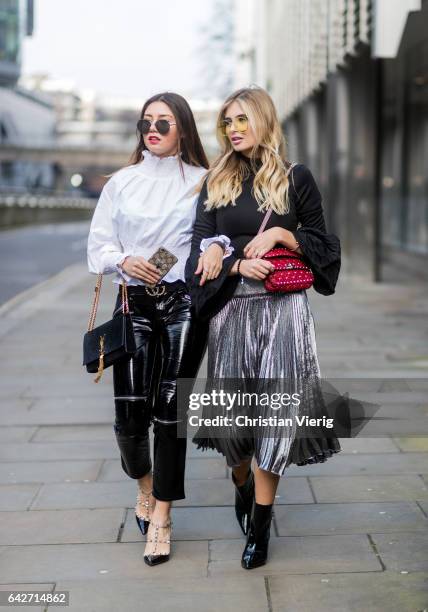 Milena Karl wearing black cropped vinyl pants, white blouse YSL bag, Valentino heels Xenia van der Woodsen wearing a black knit, silver skirt, yellow...