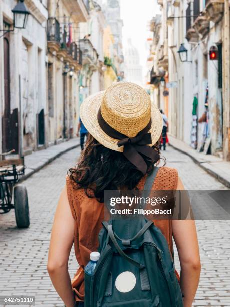 tourist woman in la havana city, cuba - pioneer stock pictures, royalty-free photos & images