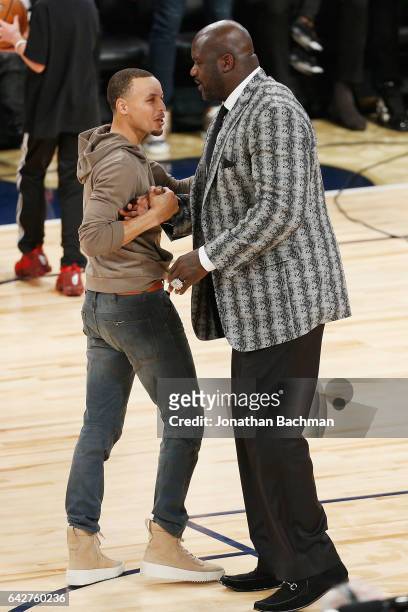 Stephen Curry of the Golden State Warriors greets Shaquille O'Neal after the 2017 JBL Three-Point Contest at Smoothie King Center on February 18,...