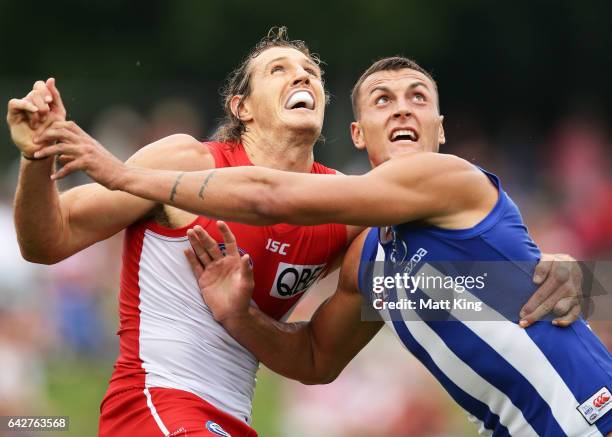 Kurt Tippett of the Swans competes for the ball against Braydon Preuss of the Kangaroos during the 2017 JLT Community Series match between the Sydney...