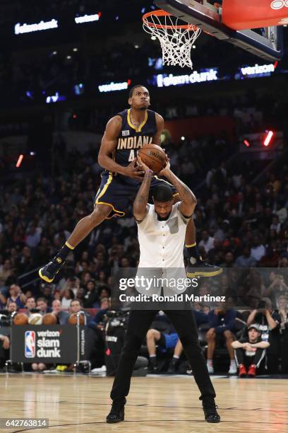 Glenn Robinson III of the Indiana Pacers competes in the 2017 Verizon Slam Dunk Contest with Paul George of the Indiana Pacers at Smoothie King...