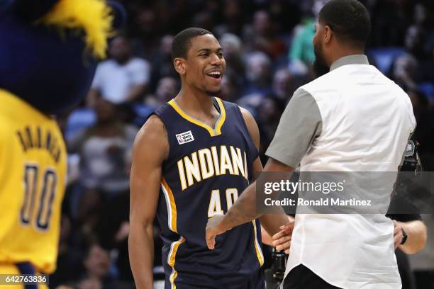 Glenn Robinson III of the Indiana Pacers reacts with Paul George of the Indiana Pacers during the 2017 Verizon Slam Dunk Contest at Smoothie King...