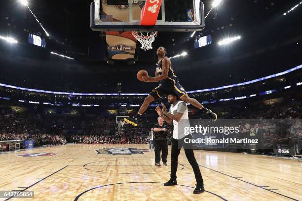 Glenn Robinson III of the Indiana Pacers competes in the 2017 Verizon Slam Dunk Contest with Paul George of the Indiana Pacers at Smoothie King...