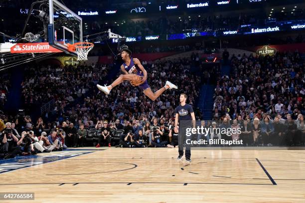 Derrick Jones Jr. #10 of the Phoenix Suns dunks during the Verizon Slam Dunk Contest on State Farm All-Star Saturday Night as part of the 2017 NBA...