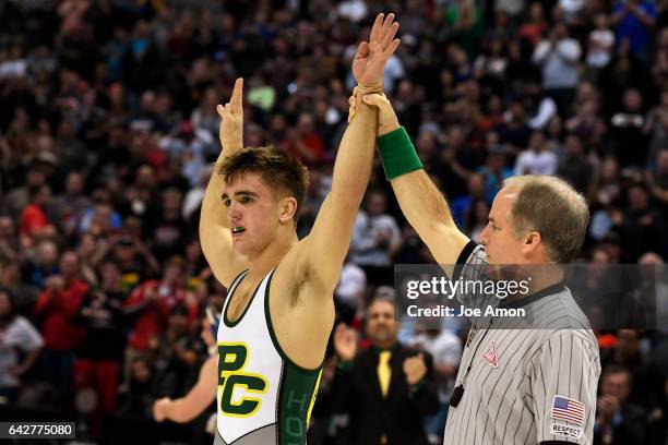 Pueblo County's Hunter Willits at 152 pounds wins his 4th State Title over Longmont's Nathan Morris after his twin brother at 132 pounds Pueblo...