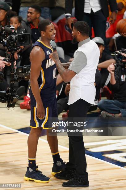 Glenn Robinson III of the Indiana Pacers reacts with Paul George of the Indiana Pacers during the 2017 Verizon Slam Dunk Contest at Smoothie King...