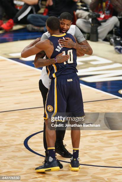 Glenn Robinson III of the Indiana Pacers reacts with Paul George of the Indiana Pacers during the 2017 Verizon Slam Dunk Contest at Smoothie King...