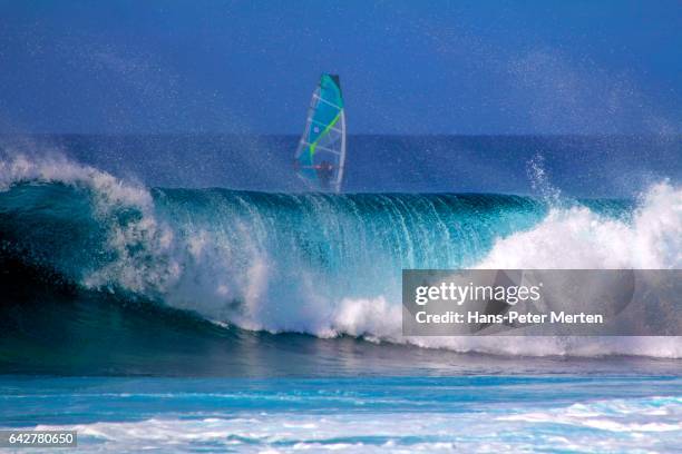 big wave and surfer, island of sal, cape verde - cape verde stock pictures, royalty-free photos & images