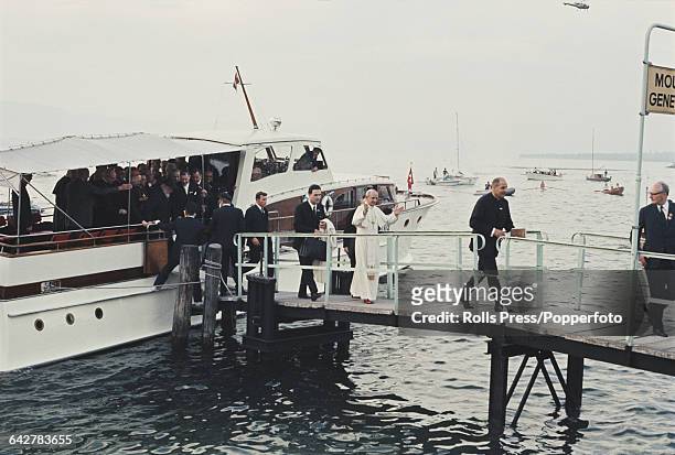 Pope Paul VI disembarks from a motor cruiser boat on Lake Geneva as he arrives in the city of Geneva in Switzerland to address the International...