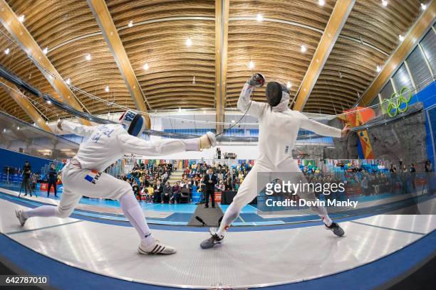 Max Heinzer of Switzerland fences Yannick Borel of France during semi-final action at the Peter Bakonyi Senior Men's Epee World Cup on February 18th,...