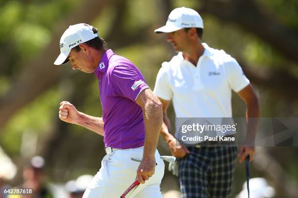 Brett Rumford of Australia celebrates after a birdie putt on the shoot out hole in match seventeen of the match play during round four of the ISPS...