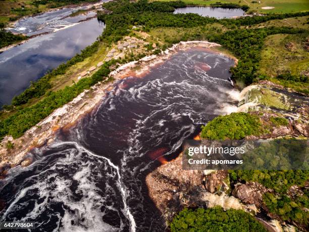 canaima lagoon waterfalls aerial view. canaima national park, venezuela - saldos stock pictures, royalty-free photos & images