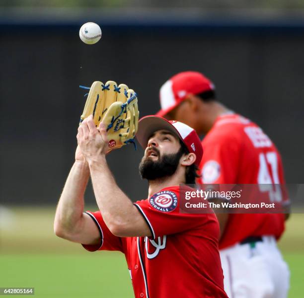 Washington Nationals pitcher Tim Collins fields a pop fly during fielding drills at the Ballpark of the Palm Beaches in West Palm Beach, Fl on...