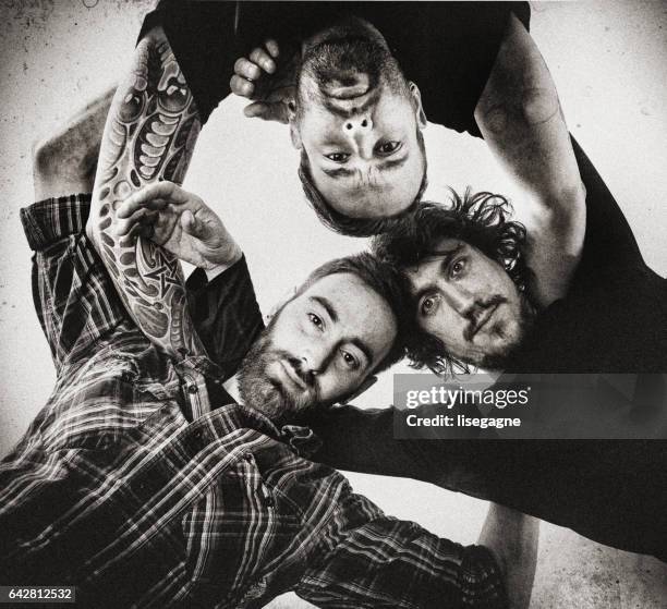 rock musicians portrait - male musician stock pictures, royalty-free photos & images