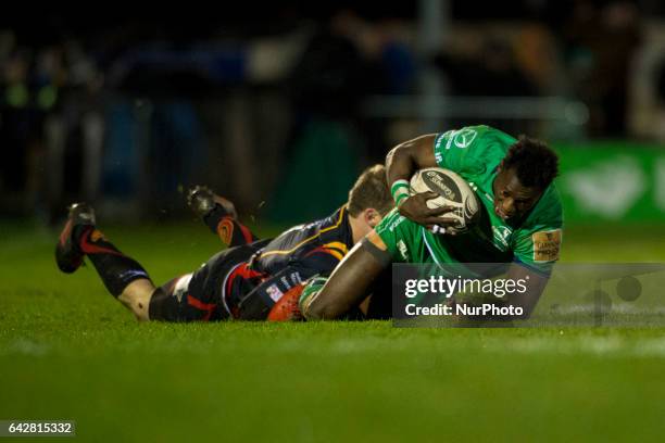 Niyi Adeolokun of Connacht tackled by Pat Howard of Dragons during the Guinness PRO12 match between Connacht Rugby and Newport Gwent Dragons at the...