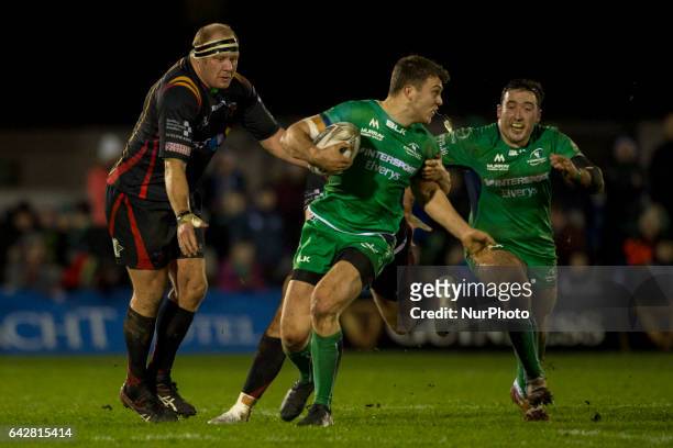 Tom Farrell and Denis Buckley of Connacht pictured with Brok Harris of Dragons during the Guinness PRO12 match between Connacht Rugby and Newport...