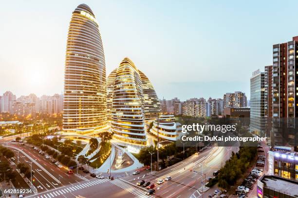 wangjing soho in beijing, china - beijing skyline night stock pictures, royalty-free photos & images