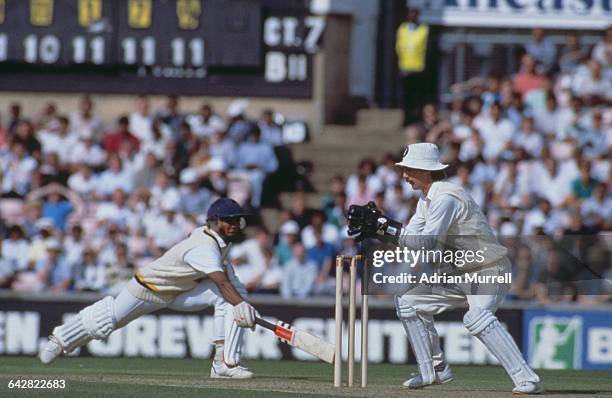 England wicket-keeper Jack Russell attempts to run out Hashan Tillakaratne of Sri Lanka, during a one day international at The Oval, London, 4th...