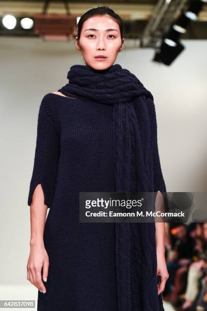 Model walks the runway at the Apu Jan show during the London Fashion Week February 2017 collections on February 19, 2017 in London, England.