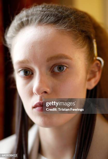 Model backstage ahead of the Theo VII show during the London Fashion Week February 2017 collections on February 19, 2017 in London, England.