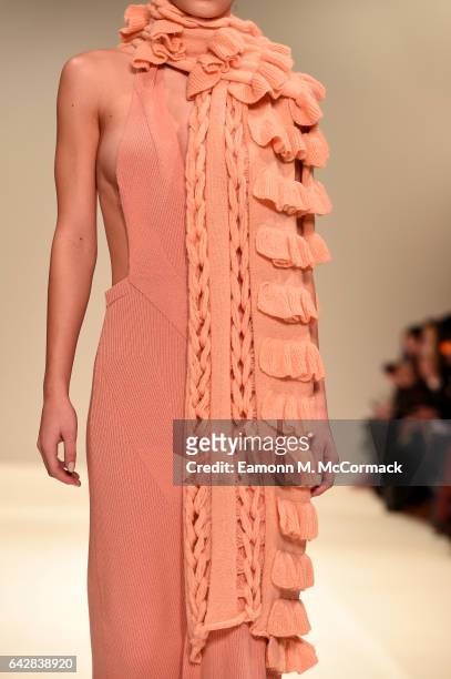 Model, detail, walks the Apu Jan show during the London Fashion Week February 2017 collections on February 19, 2017 in London, England.