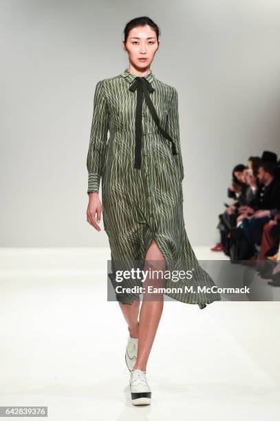 Model walks the runway at the Apu Jan show during the London Fashion Week February 2017 collections on February 19, 2017 in London, England.