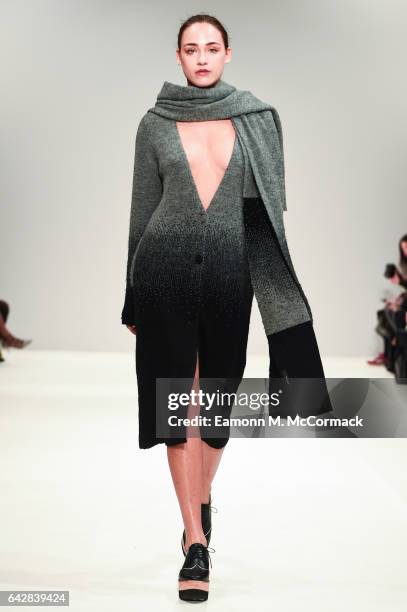 Model walks the runway at the Apu Jan show during the London Fashion Week February 2017 collections on February 19, 2017 in London, England.