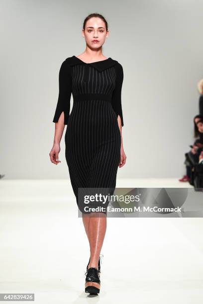 Model walks the runway at the Apu Jan show during the London Fashion Week February 2017 collections on February 19, 2017 in London, England.