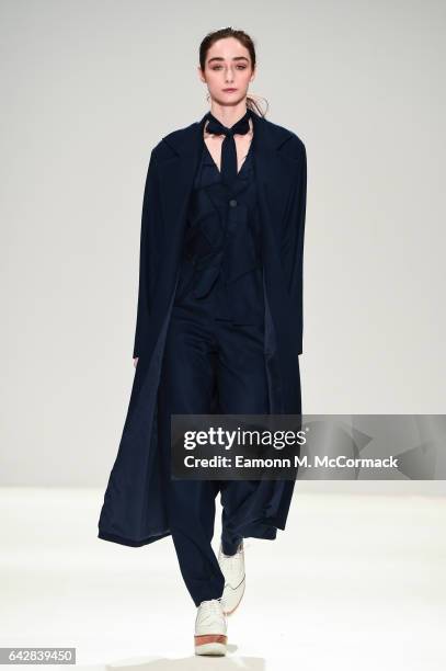 Model walks the runway at the Apu Jan show during the London Fashion Week February 2017 collections on February 19, 2017 in London, England.