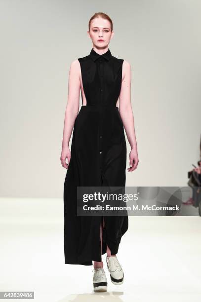 Model walks the runway at the Apu Jan show during the London Fashion Week February 2017 collections on February 19, 2017 in London, England.