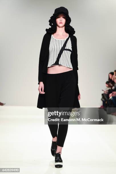 Model walks the runway at the Apu Jan show during the London Fashion Week February 2017 collections on February 19, 2017 in London, England.