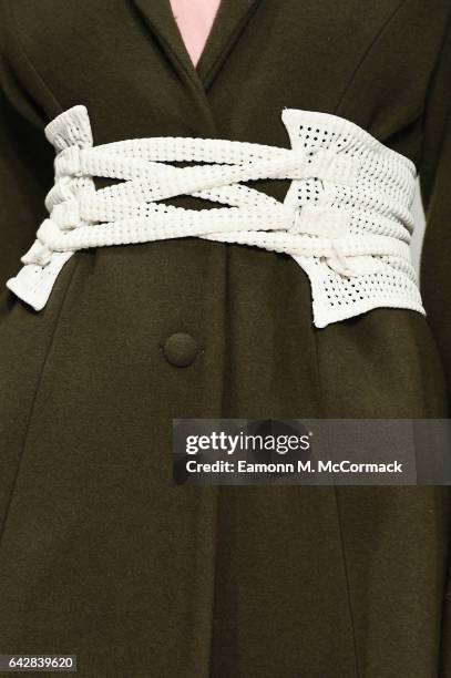 Model , detail, walks the runway at the Apu Jan show during the London Fashion Week February 2017 collections on February 19, 2017 in London, England.