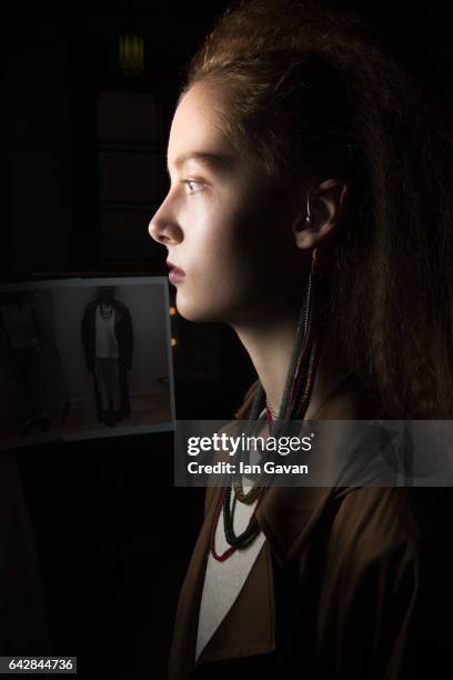 Model backstage ahead of the Theo VII show during the London Fashion Week February 2017 collections on February 19, 2017 in London, England.