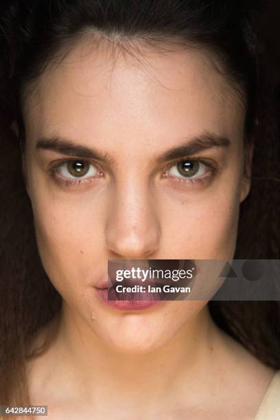 Model backstage ahead of the Theo VII show during the London Fashion Week February 2017 collections on February 19, 2017 in London, England.